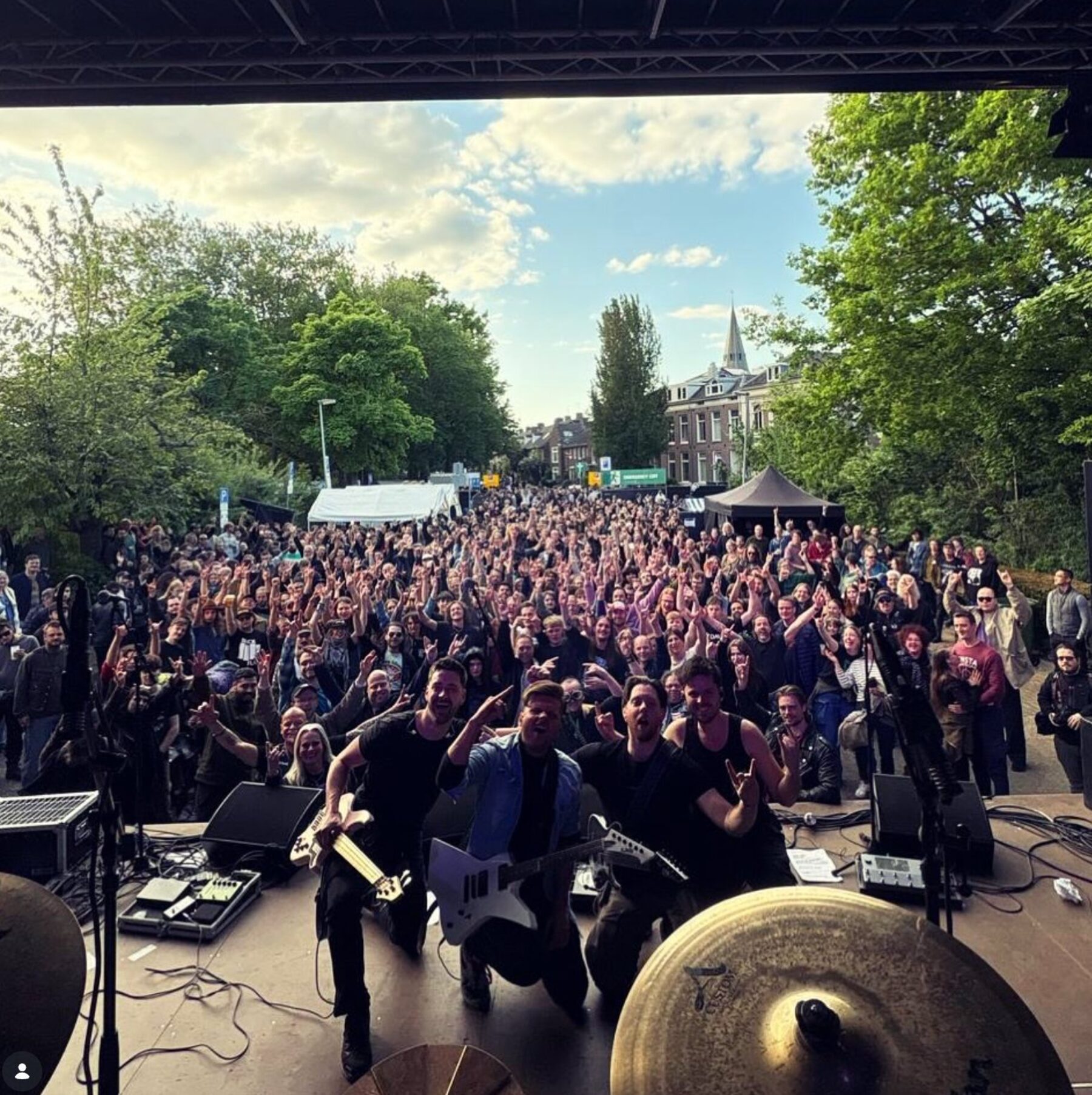 UNDAWN with a massive crowd stretching down the street